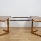 Mid-century round extendable teak dining table from McIntosh, United Kingdom, 1960s