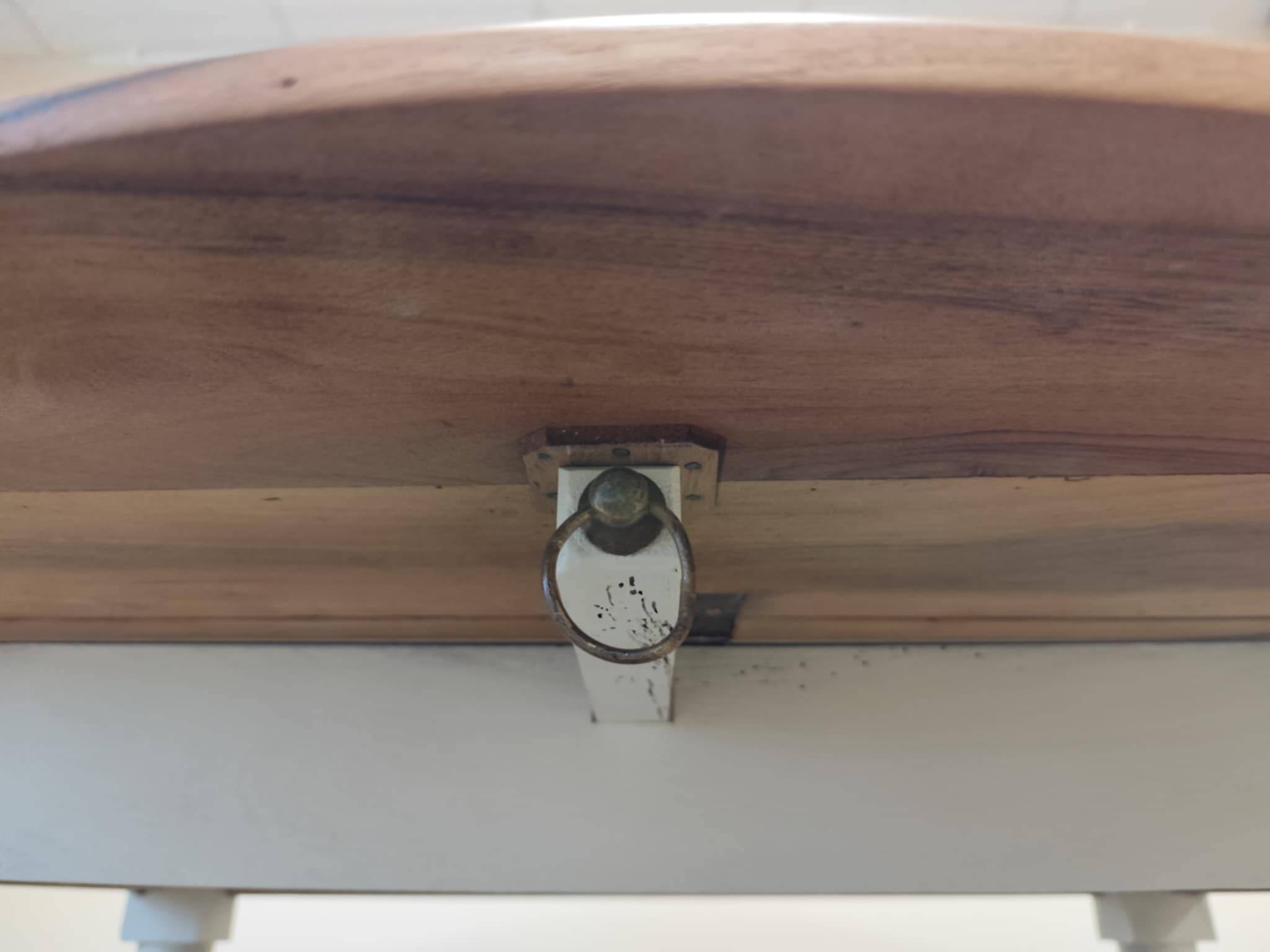 Round walnut table convertible into a console.