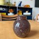 Small brown blown glass vintage vase