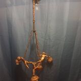 Antique chandelier decorated with cherubs and putti angels taken from the attic