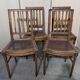 Set of four Louis XVI style chairs in carved wood.