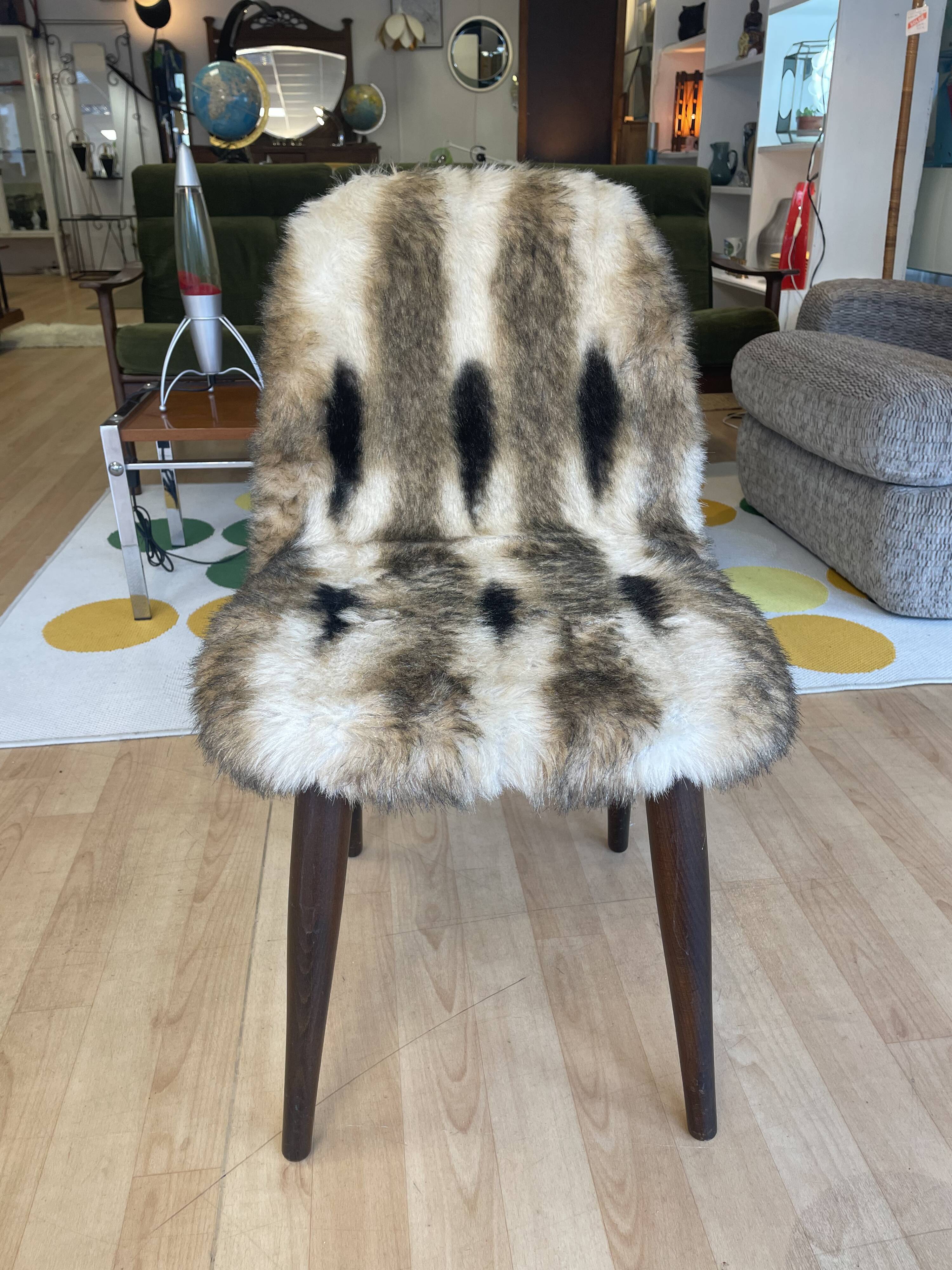 Faux fur chair with patterns & tapered dark wood legs