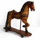 Antique painted wooden rocking horse – Large decorative model on wheels