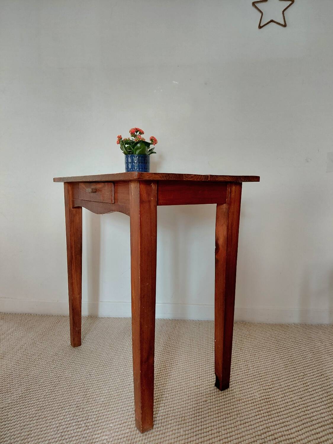 Small antique solid wood table in chic country style with a drawer.
