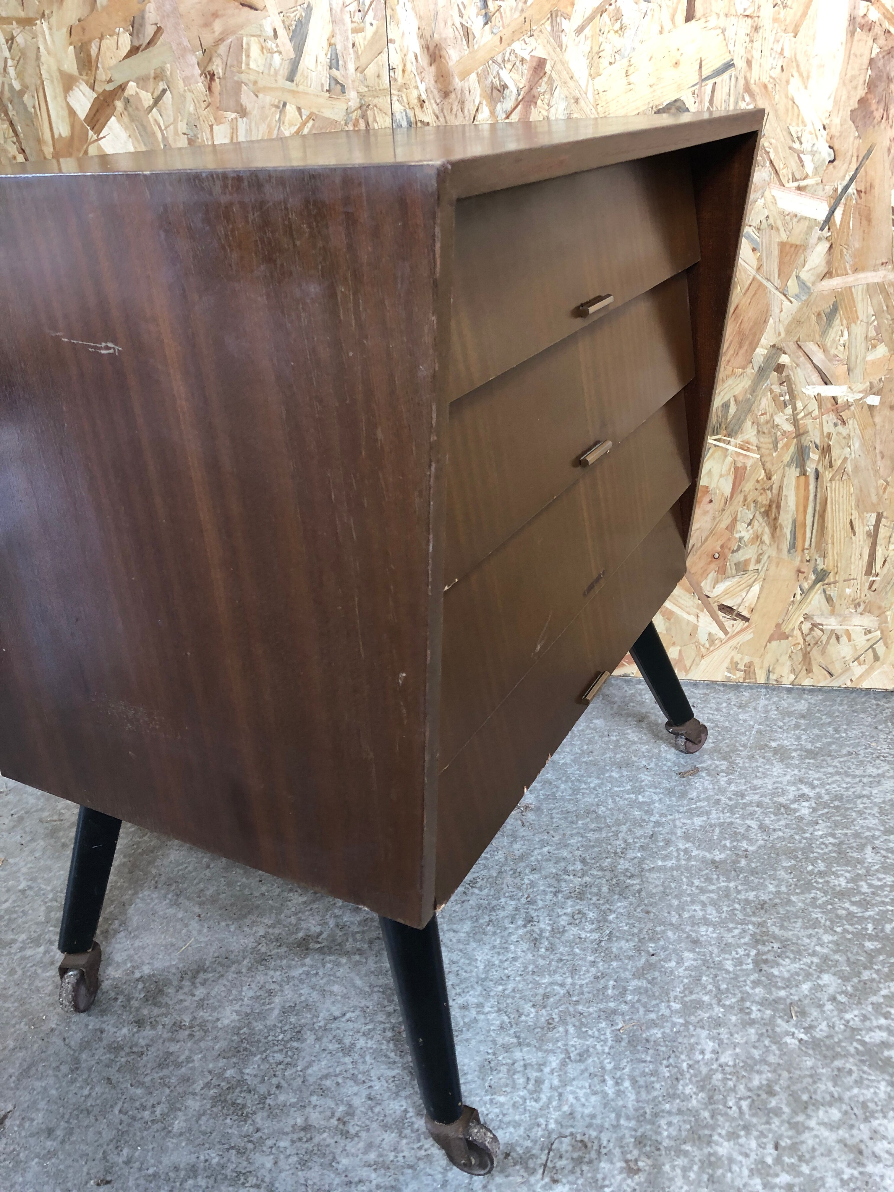 Old chest of drawers 4 drawers wood feet compass black + castors 70s vintage