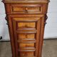 Cherry nightstand with pink marble.