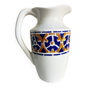 Pitcher/vase with stylized orange and blue Art Deco floral pattern