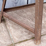 Old industrial stool in metal