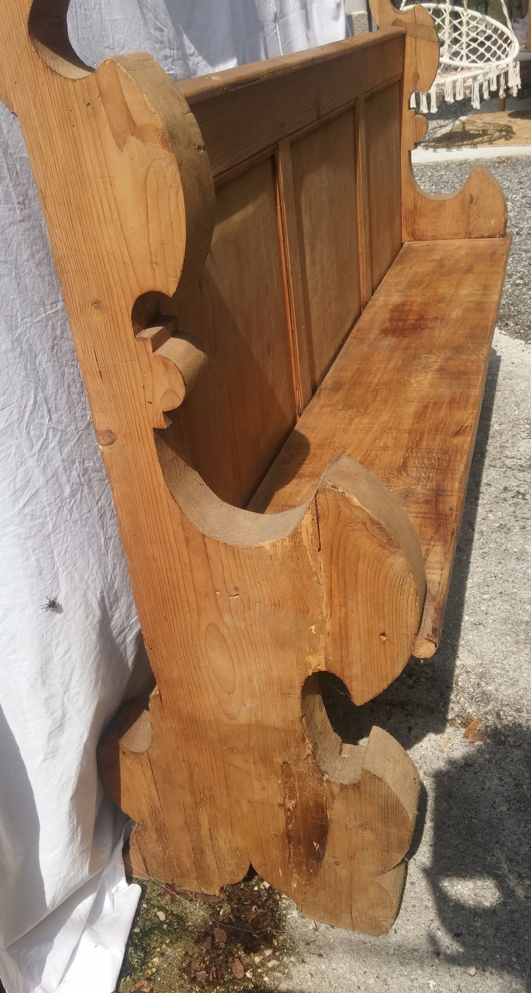 Old shabby English-style pine bench