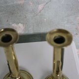 Pair of brass push-up candlesticks