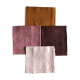 Set of four old damask towels tinted in multiple colors