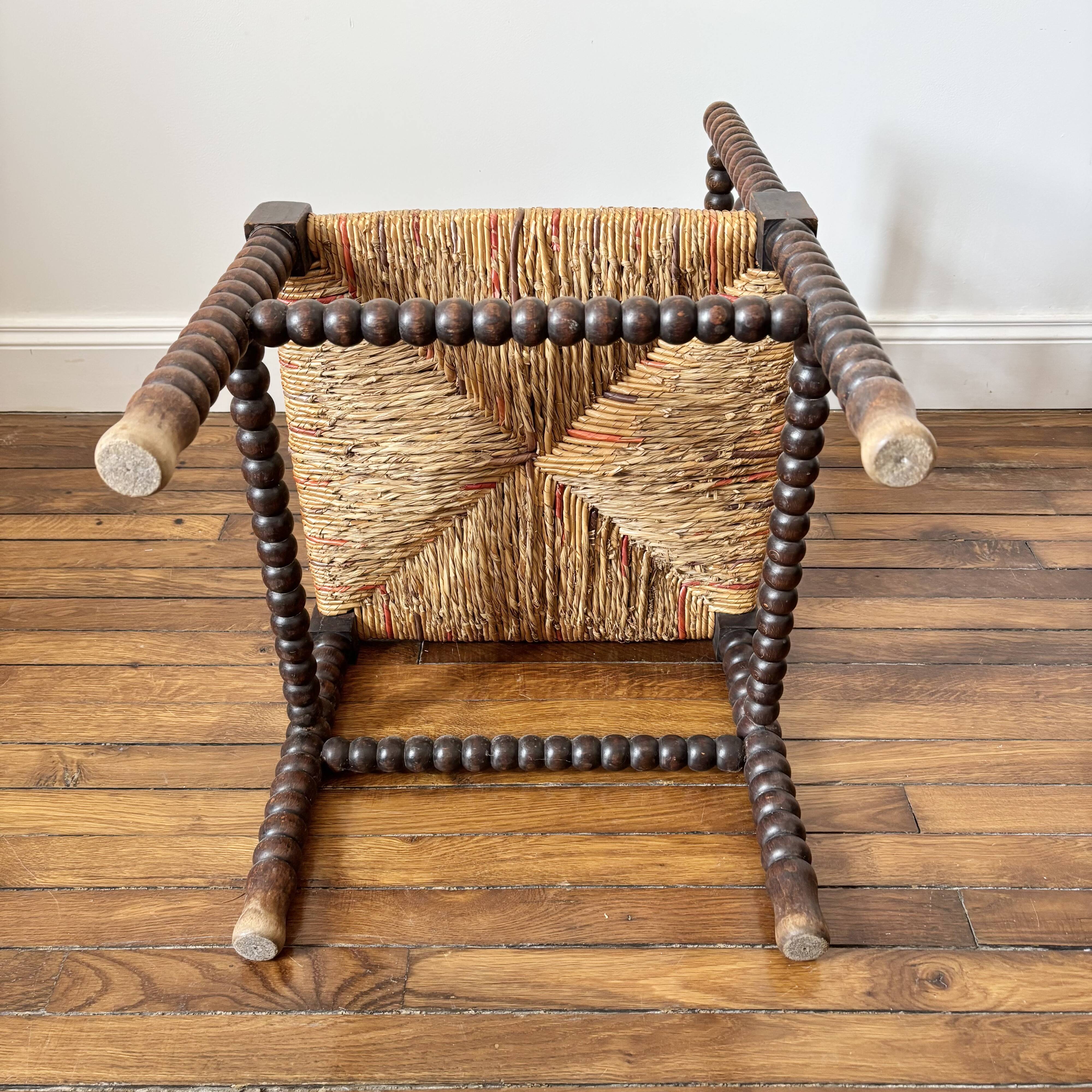 Vintage corner chair in turned wood and straw