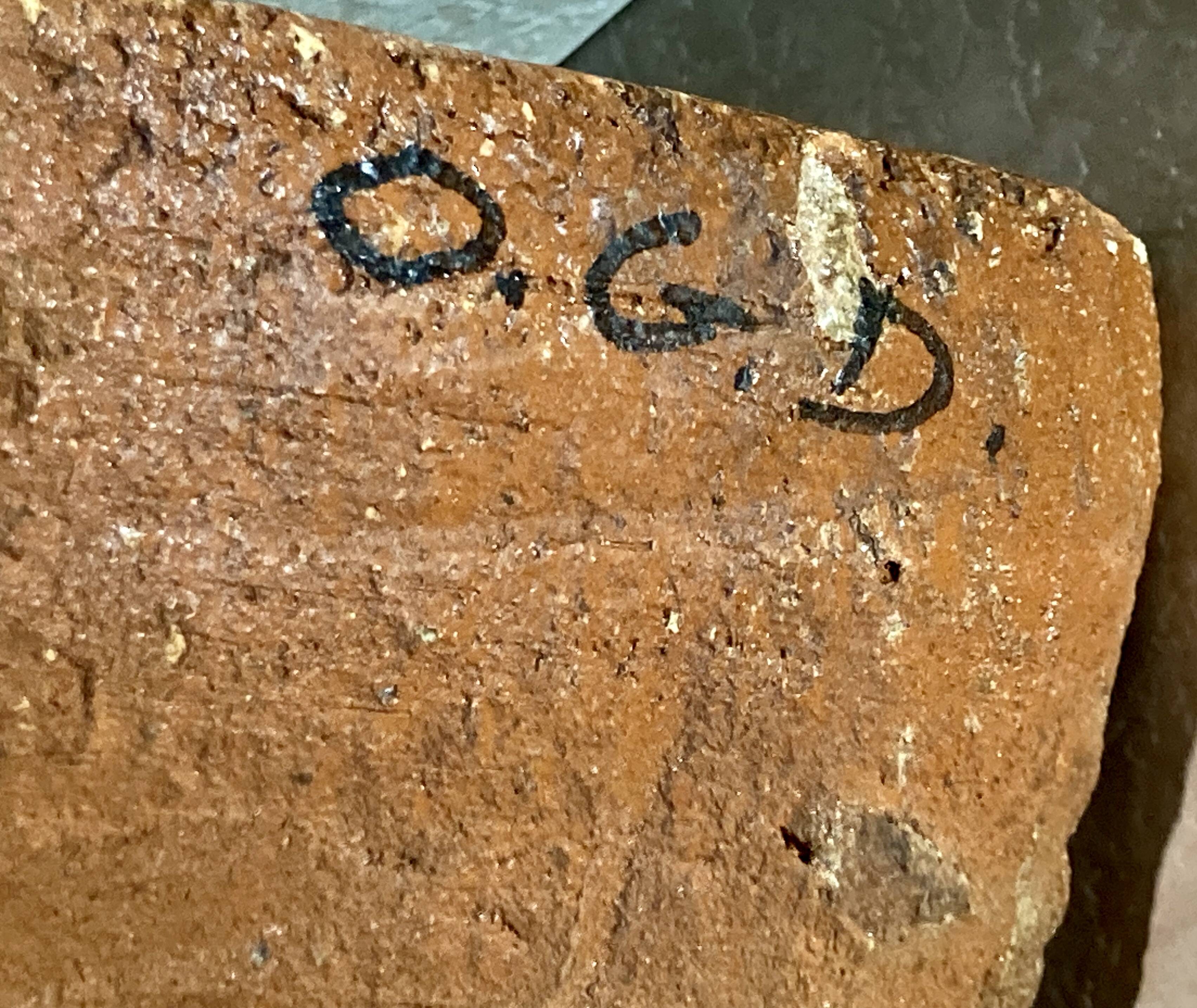 Terracotta tile with enamel decoration of a lady of the high nobility signed OGD