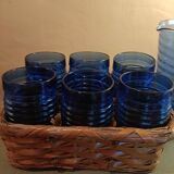 Orangeade carafe service and 6 glasses in a wicker basket