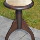 Rotating piano stool