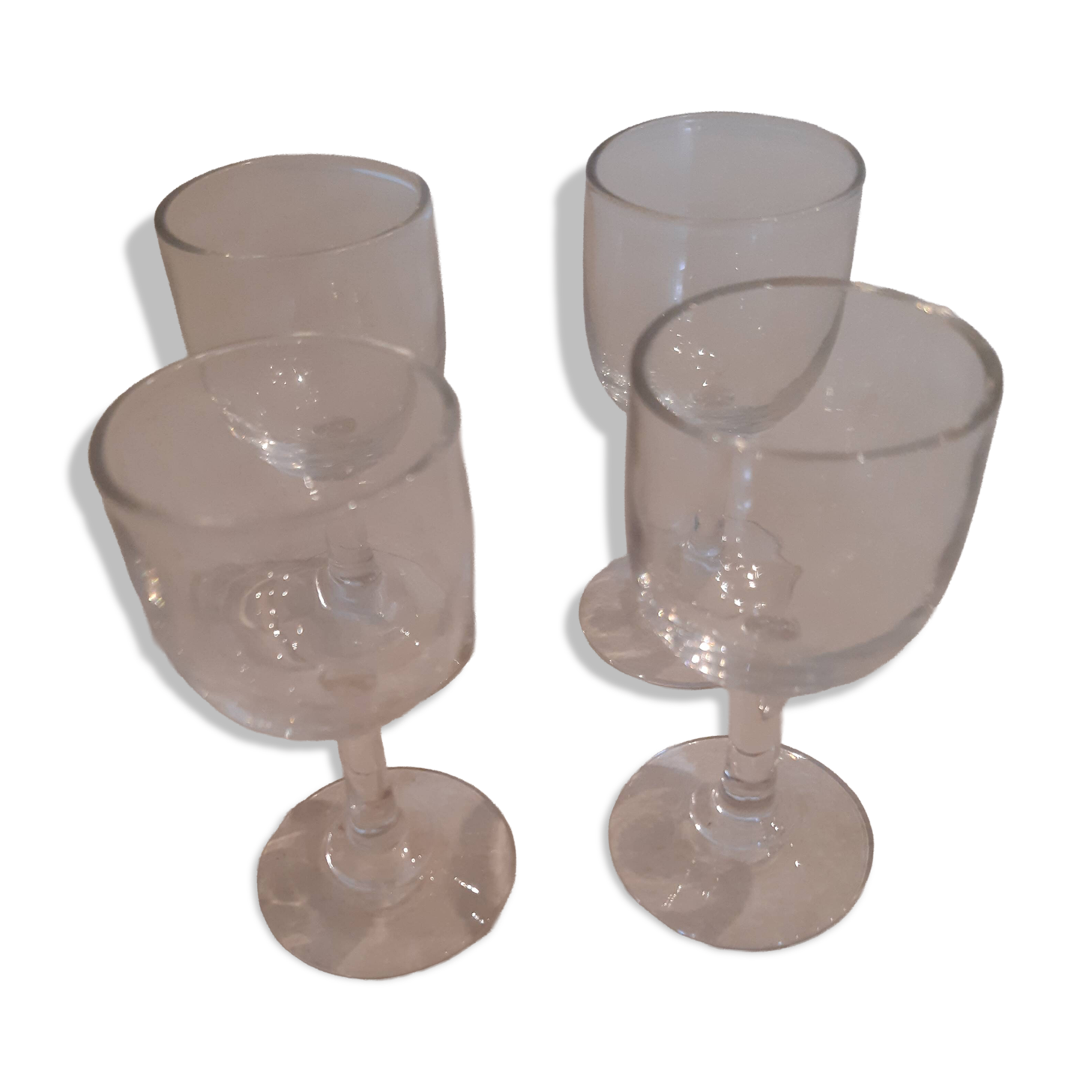 Set of 4 small stemmed glasses for strong alcohol.