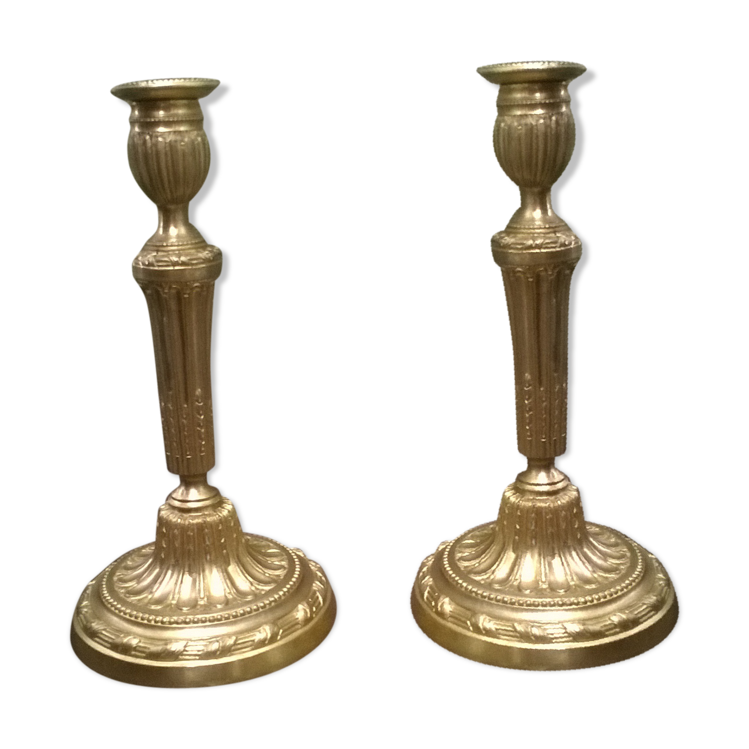 Pair of golden bronze candlesticks