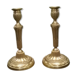 Paire de bougeoirs en bronze doré