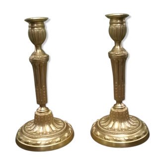 Paire de bougeoirs en bronze doré