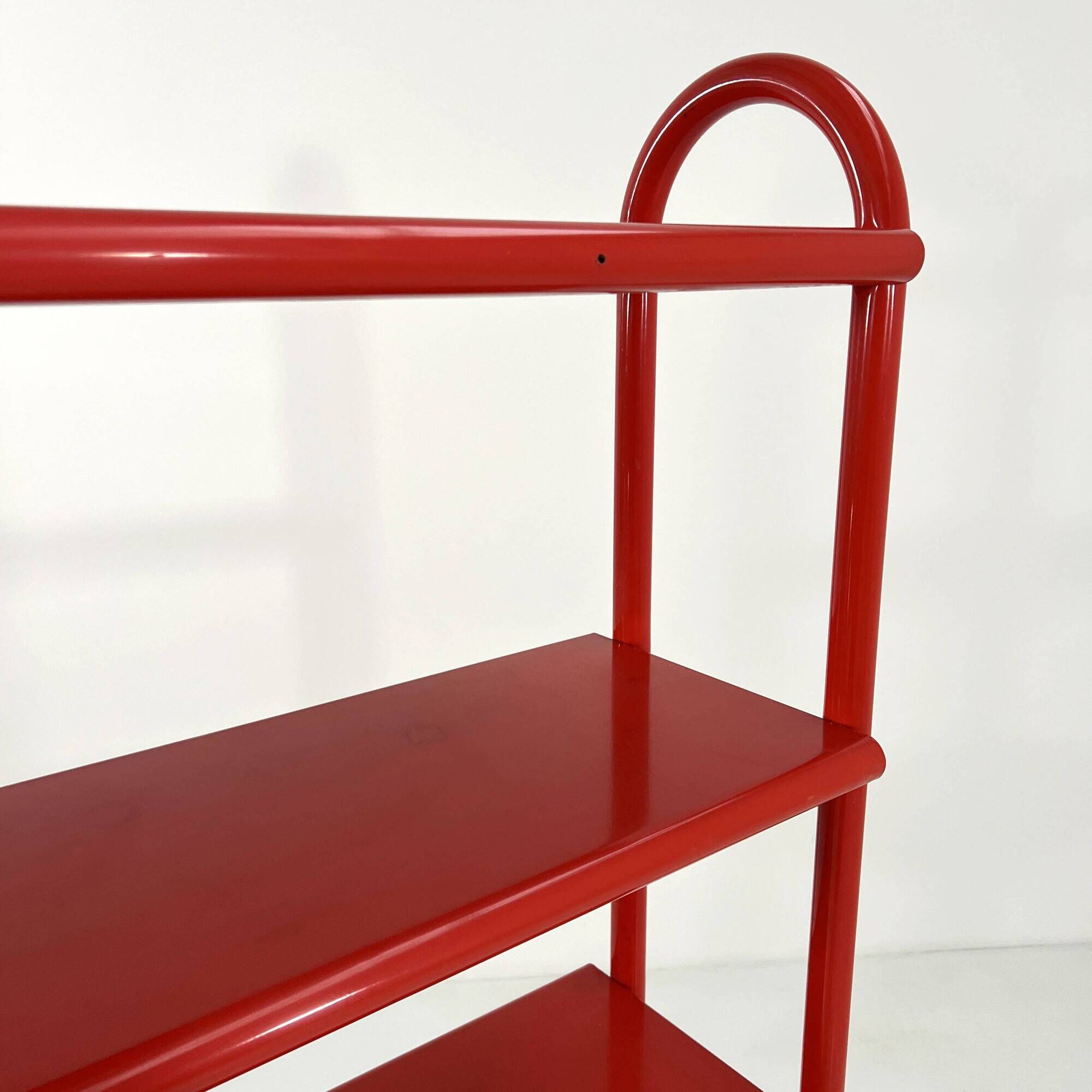Red tubular leg shelf, 1980