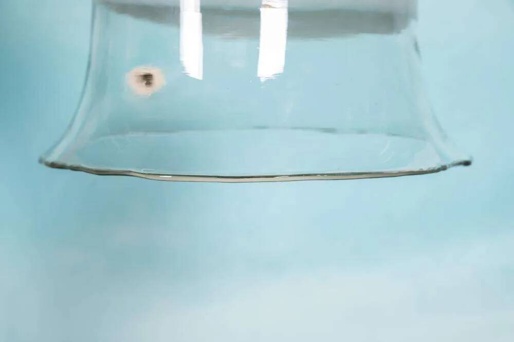 Minimalist glass pendant light Peil & Putzler from the space age