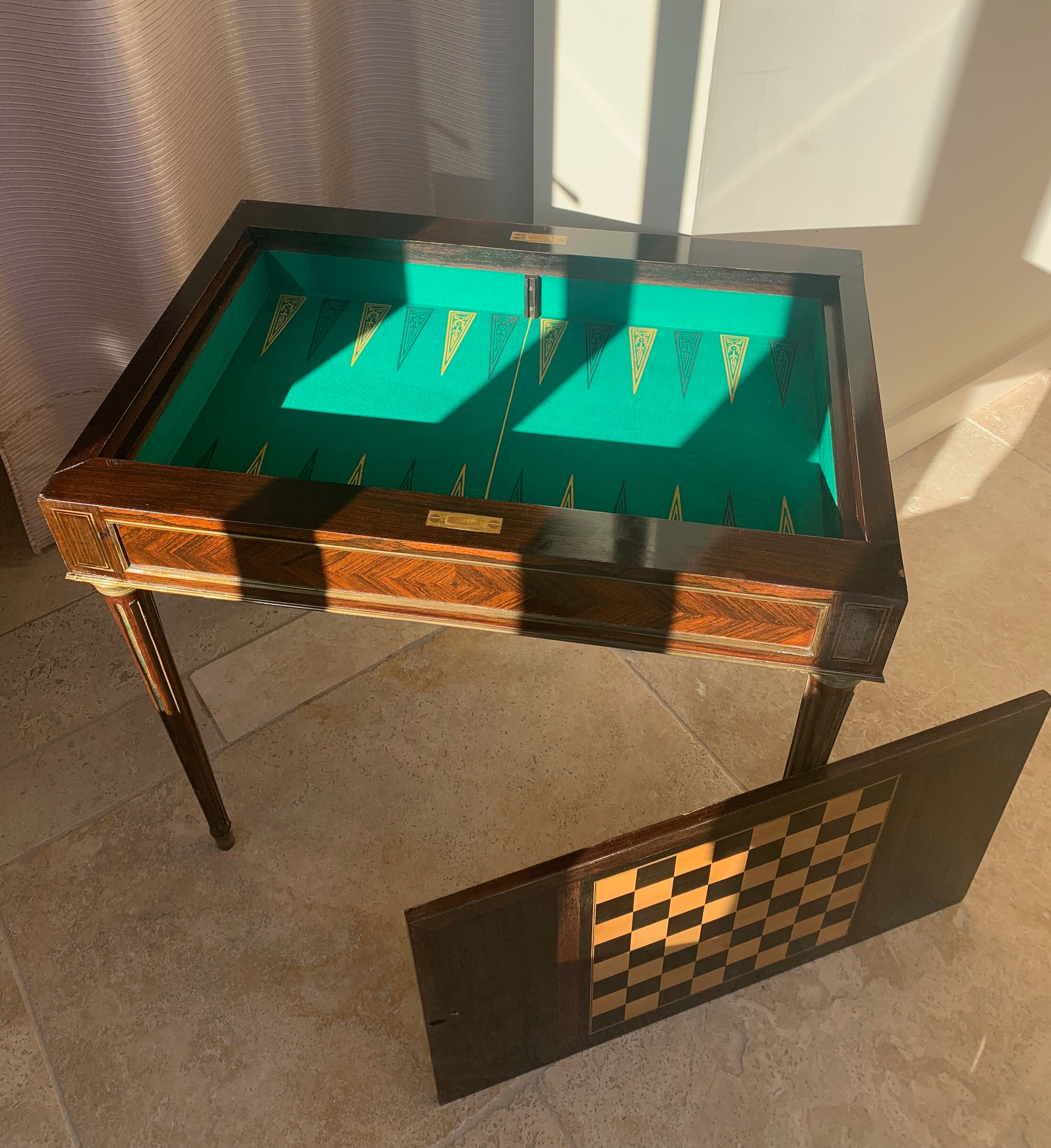GAMES TABLE Louis XVI late nineteenth, in inlaid checkered rosewood and backgammon
