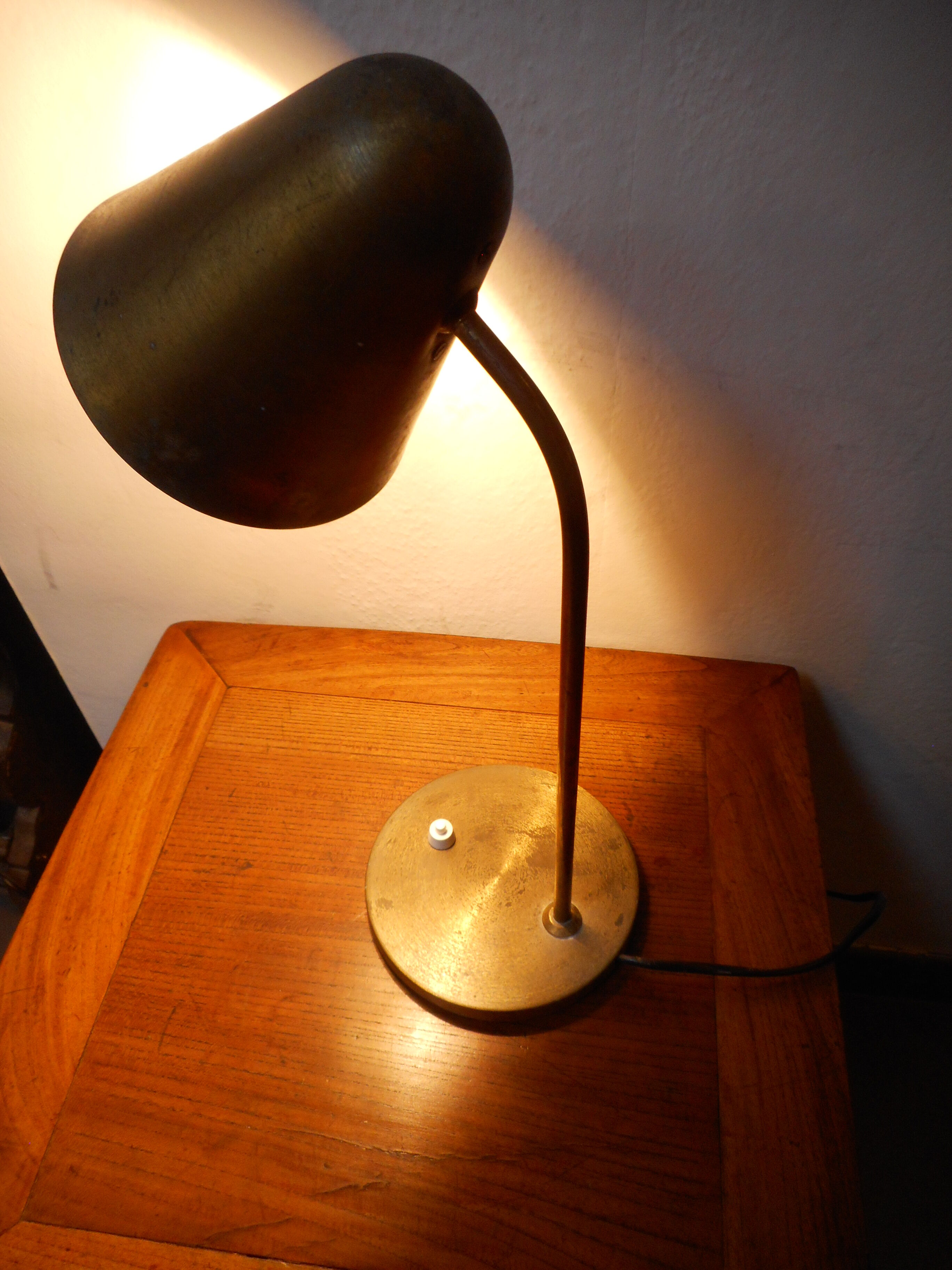 Hinged brass lamp