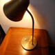 Hinged brass lamp