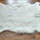 Tapis vintage peau de chèvre 87 cm X 65.5 cm