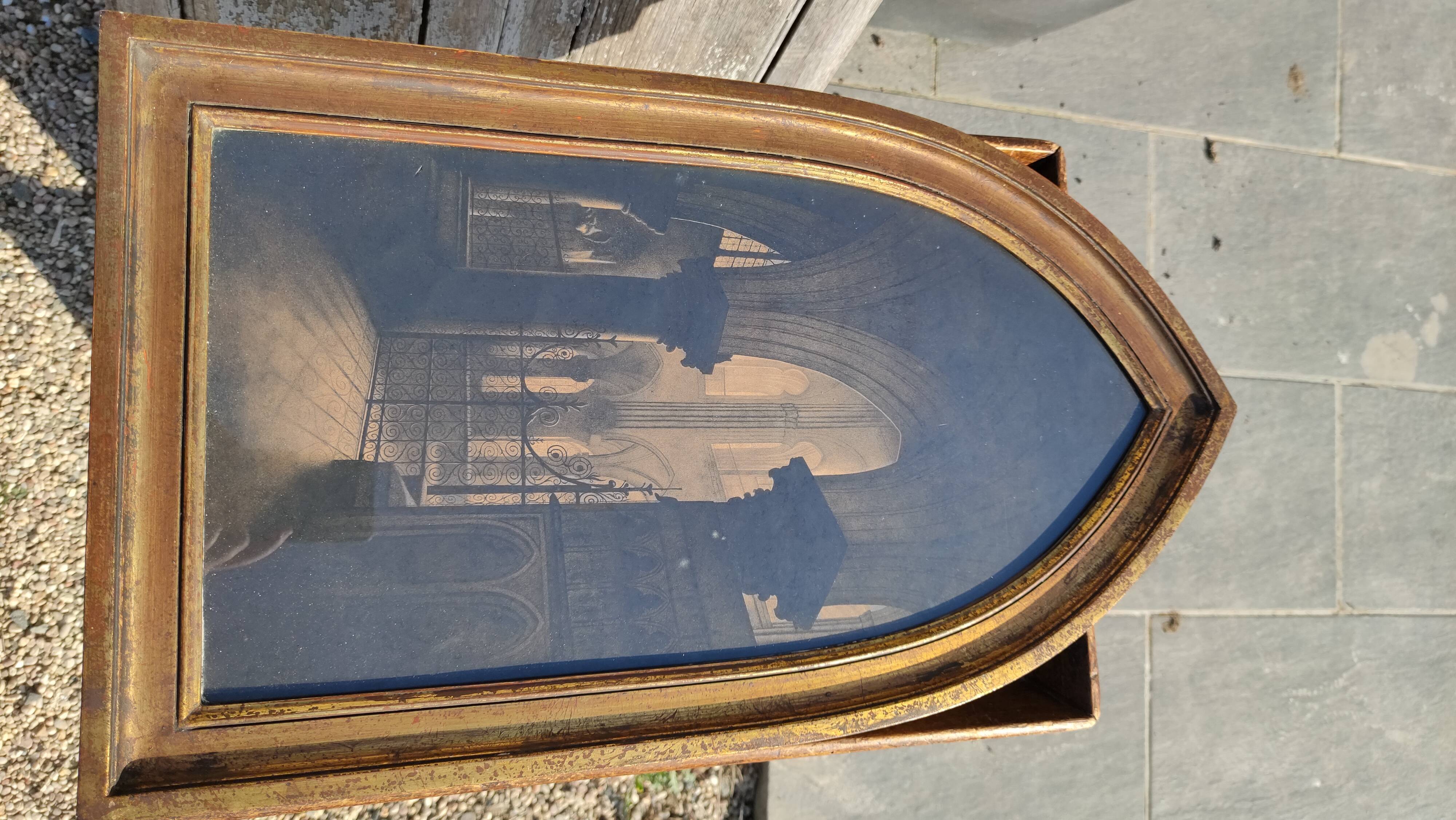 Large old wall frame in gilded wood