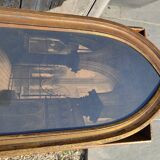 Large old wall frame in gilded wood