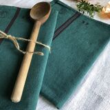 Old linen and cotton tea towel tinted in fir green