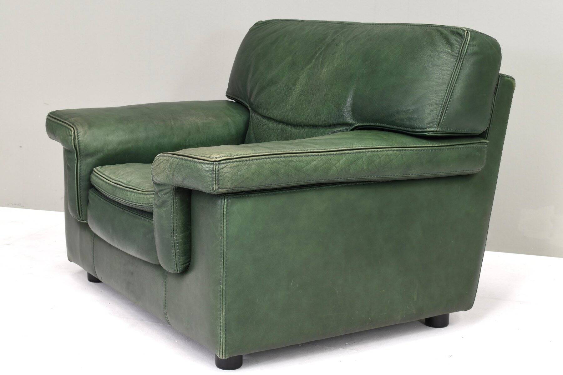 Roche Bobois lounge armchair in original green patinated leather, 1970