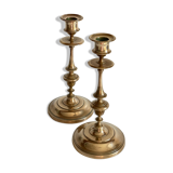 Pair of antique candle holders in solid brass