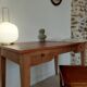 Bureau ancien à double tiroir, pieds gainés, XIXème