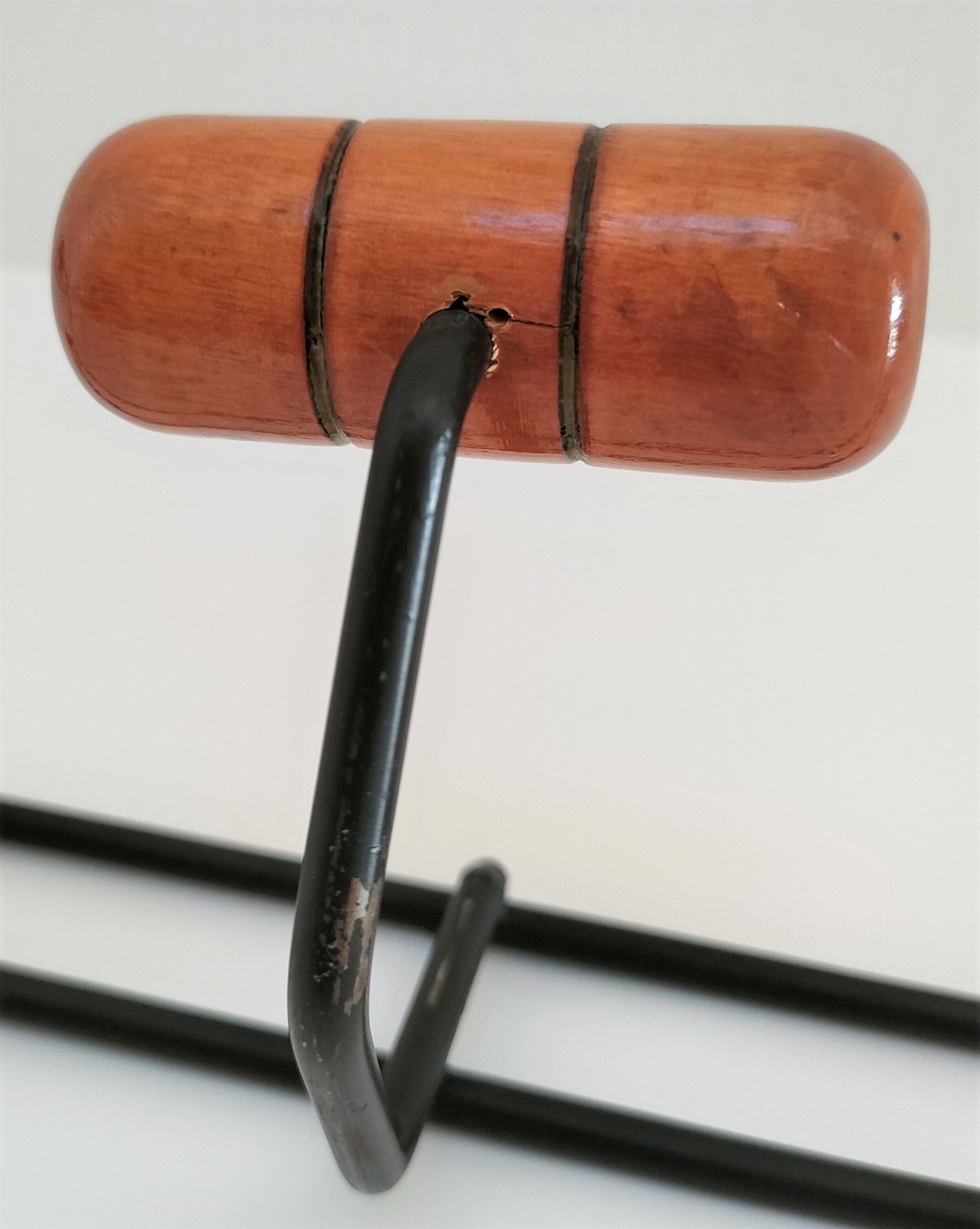 Modernist wall-mounted coat rack in metal and wood, 60s design