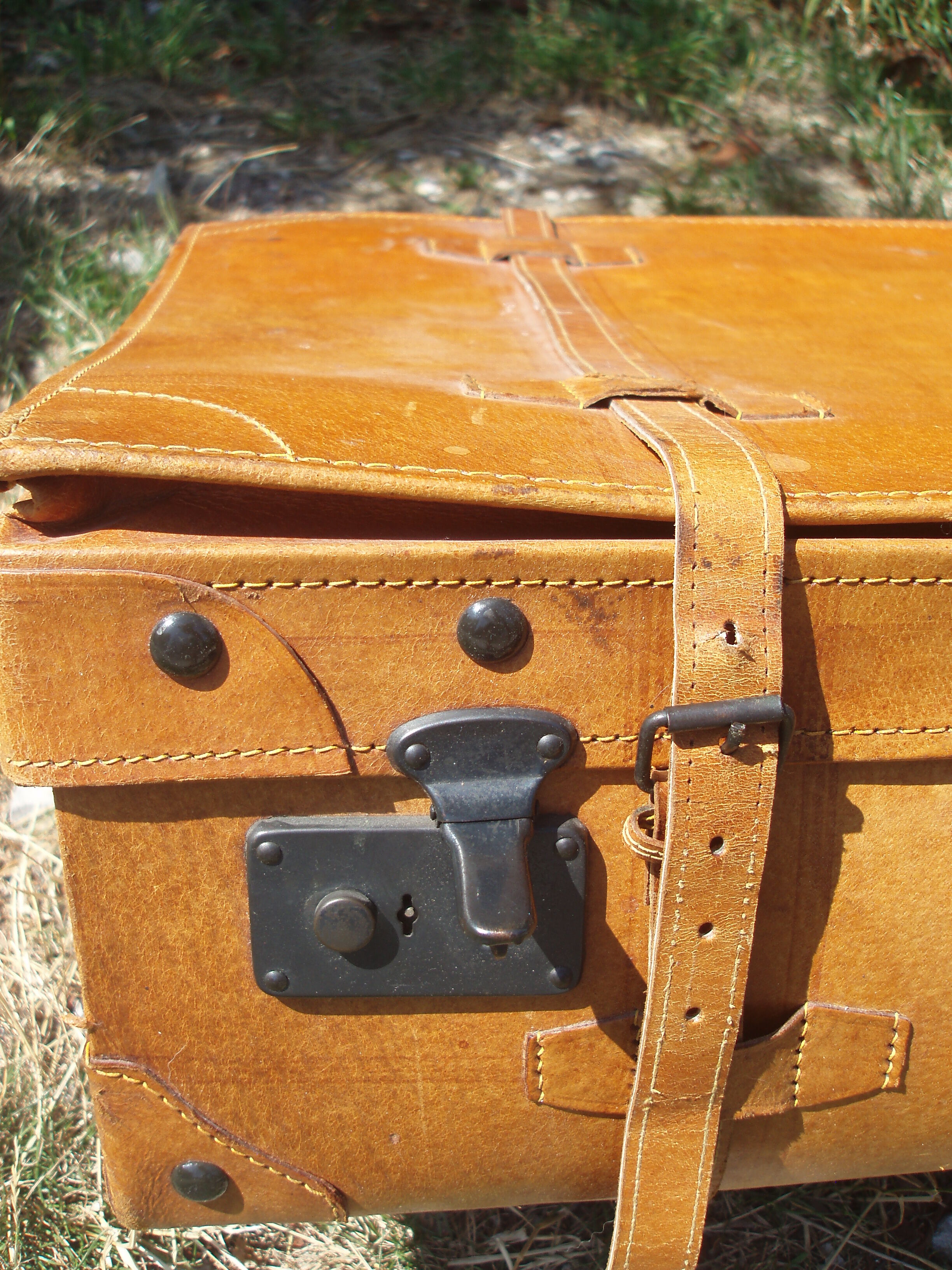 Old quality brown leather suitcase from the 60s