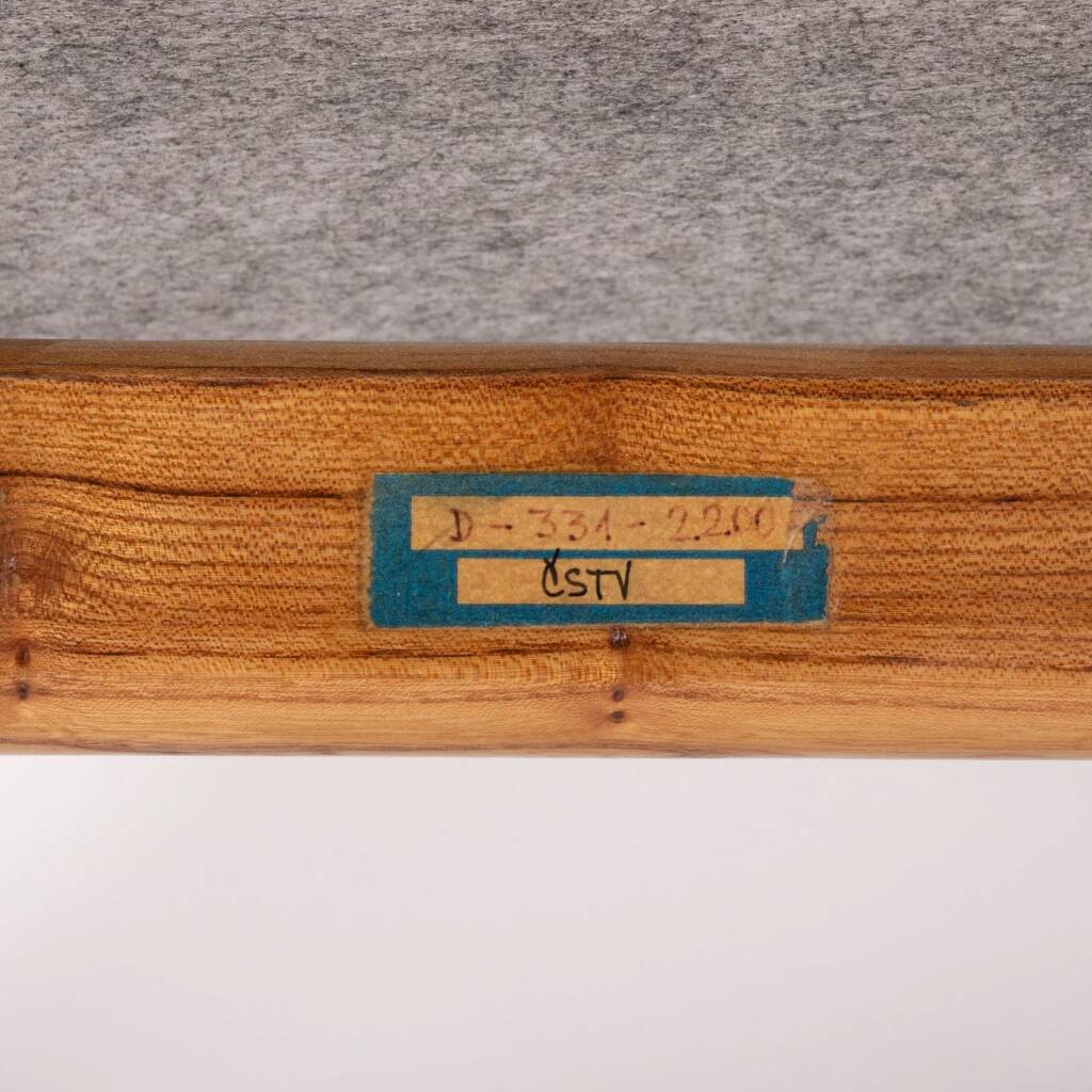 Wooden armchair with pea green upholstery