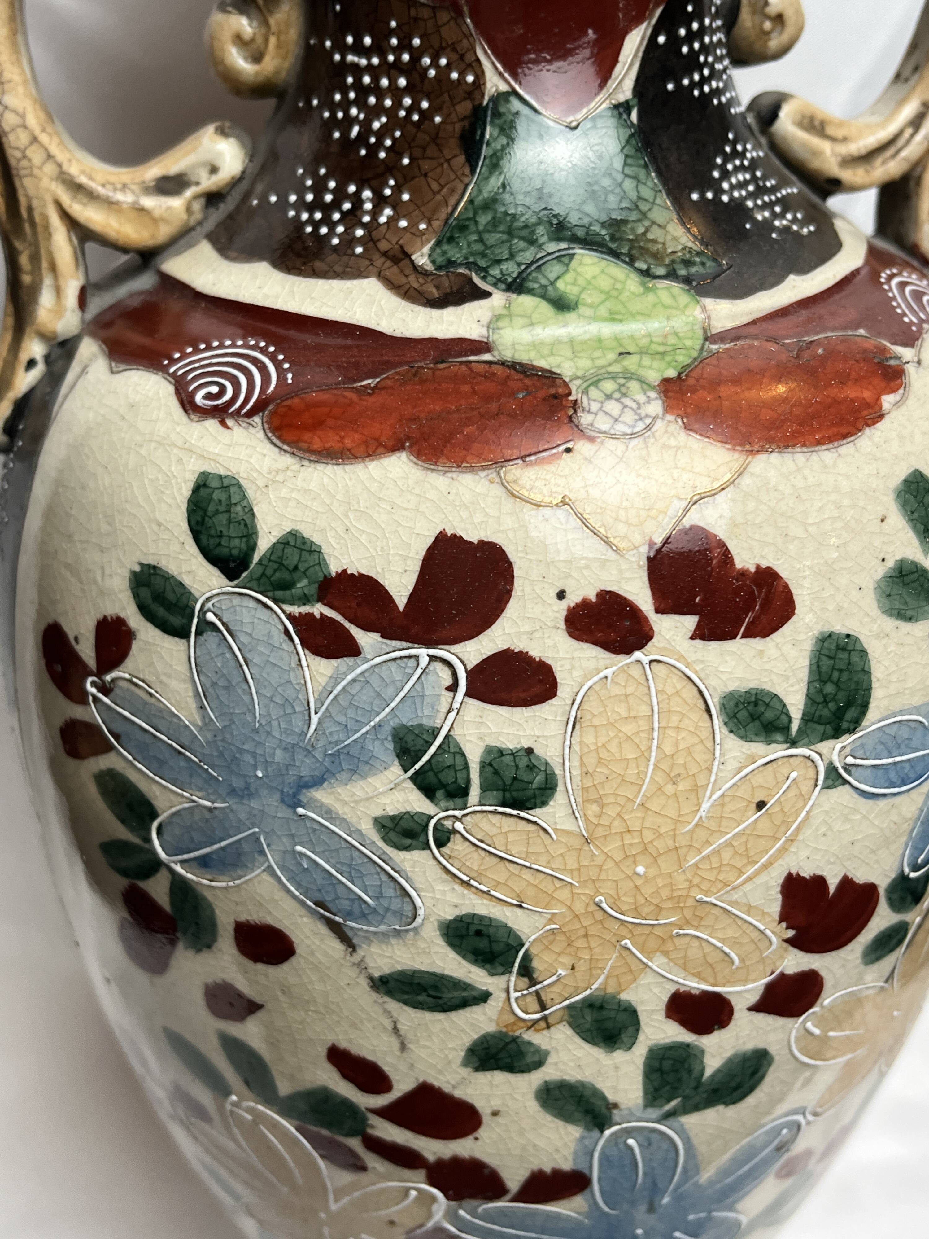 Japan, Satsuma vase with richly decorated handles, signed, early 20th century