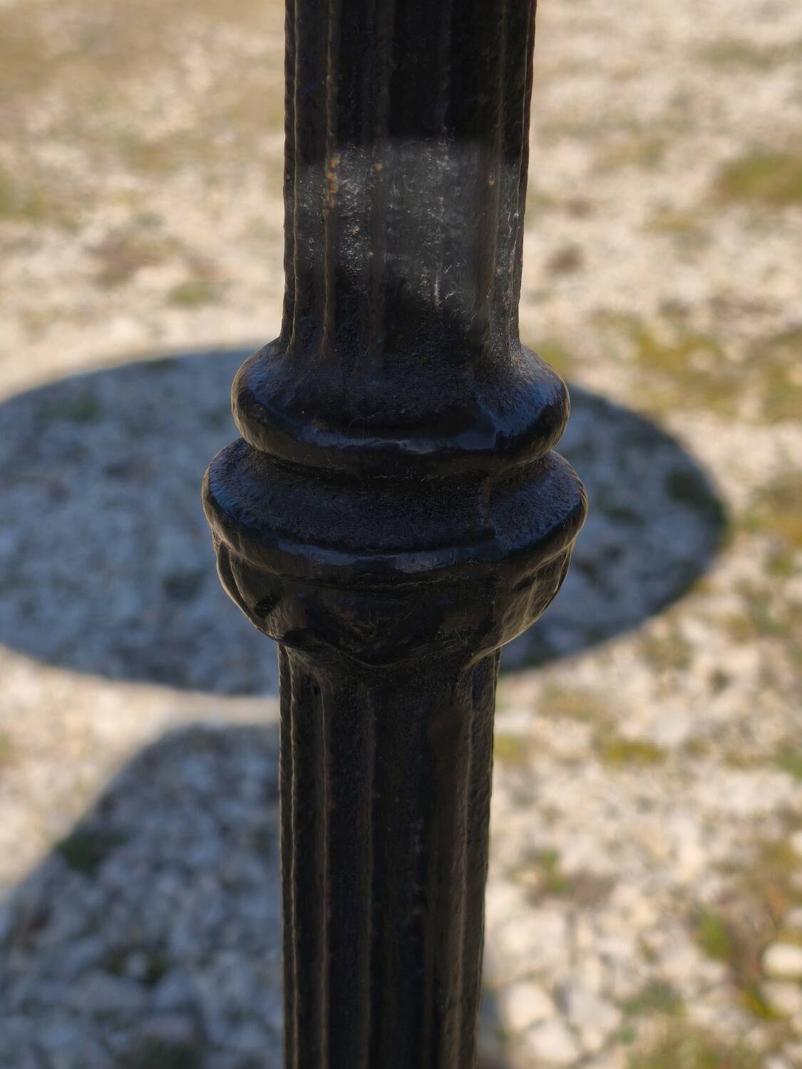 Marble bistro table with cast iron legs in Parisian café style