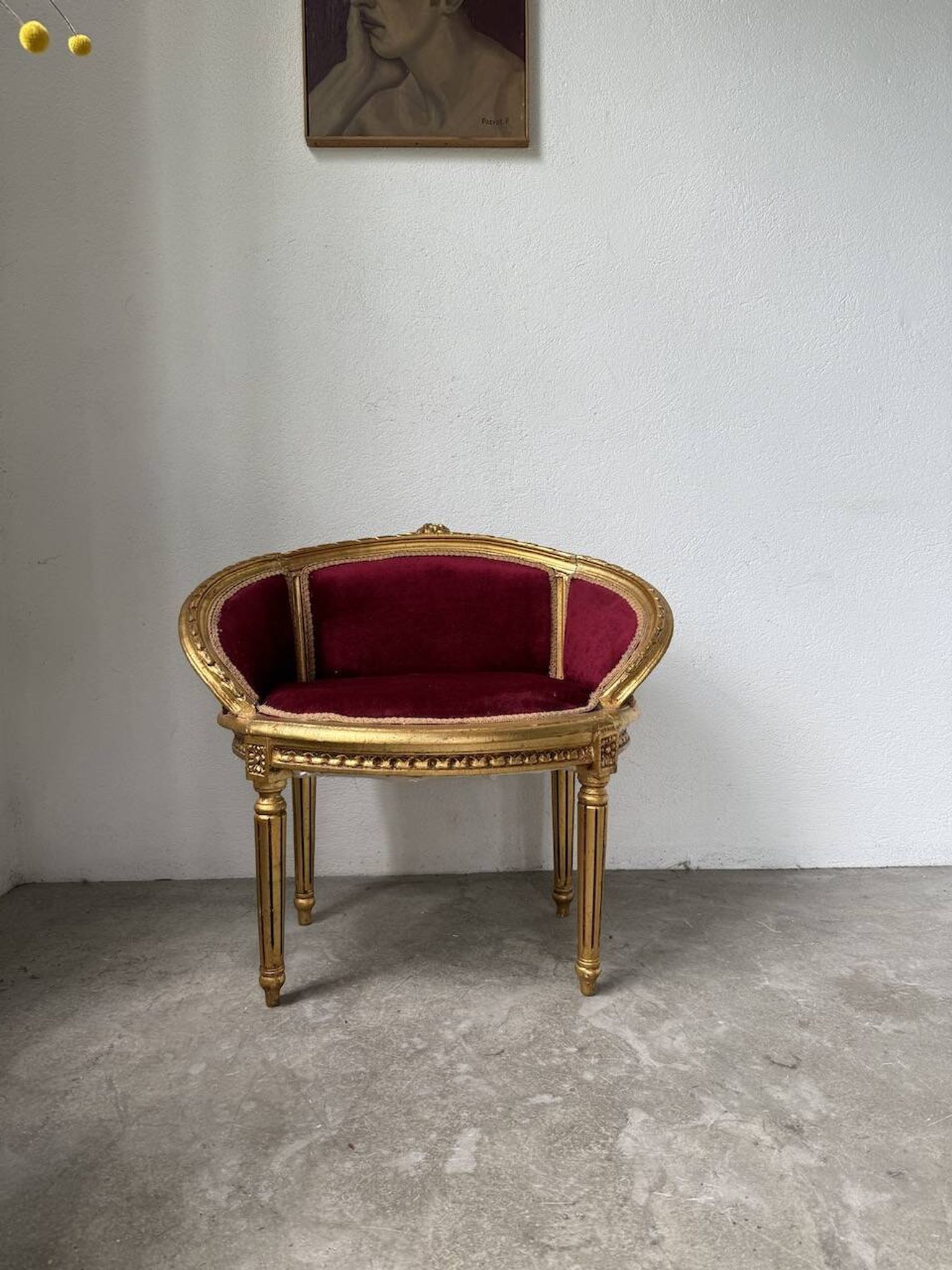 Louis XVI gilt wood and red velvet armchair