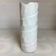 Vase with patterns of rolled paper leaves