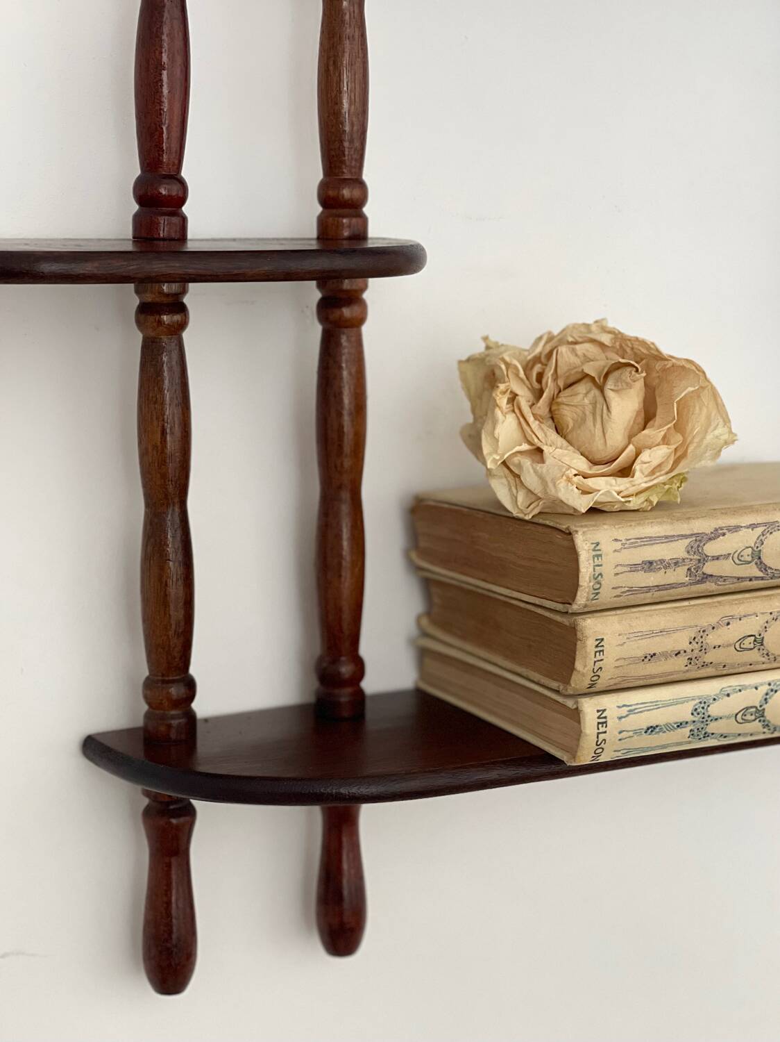 Turned wood wall shelf