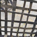 5 blackened wooden stools with woven leather seats by Nina Kaufmann