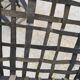 5 blackened wooden stools with woven leather seats by Nina Kaufmann