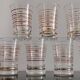 Set of 7 vintage glasses with gold and red edges from the 50s/60s