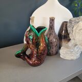 Old ceramic fish jug