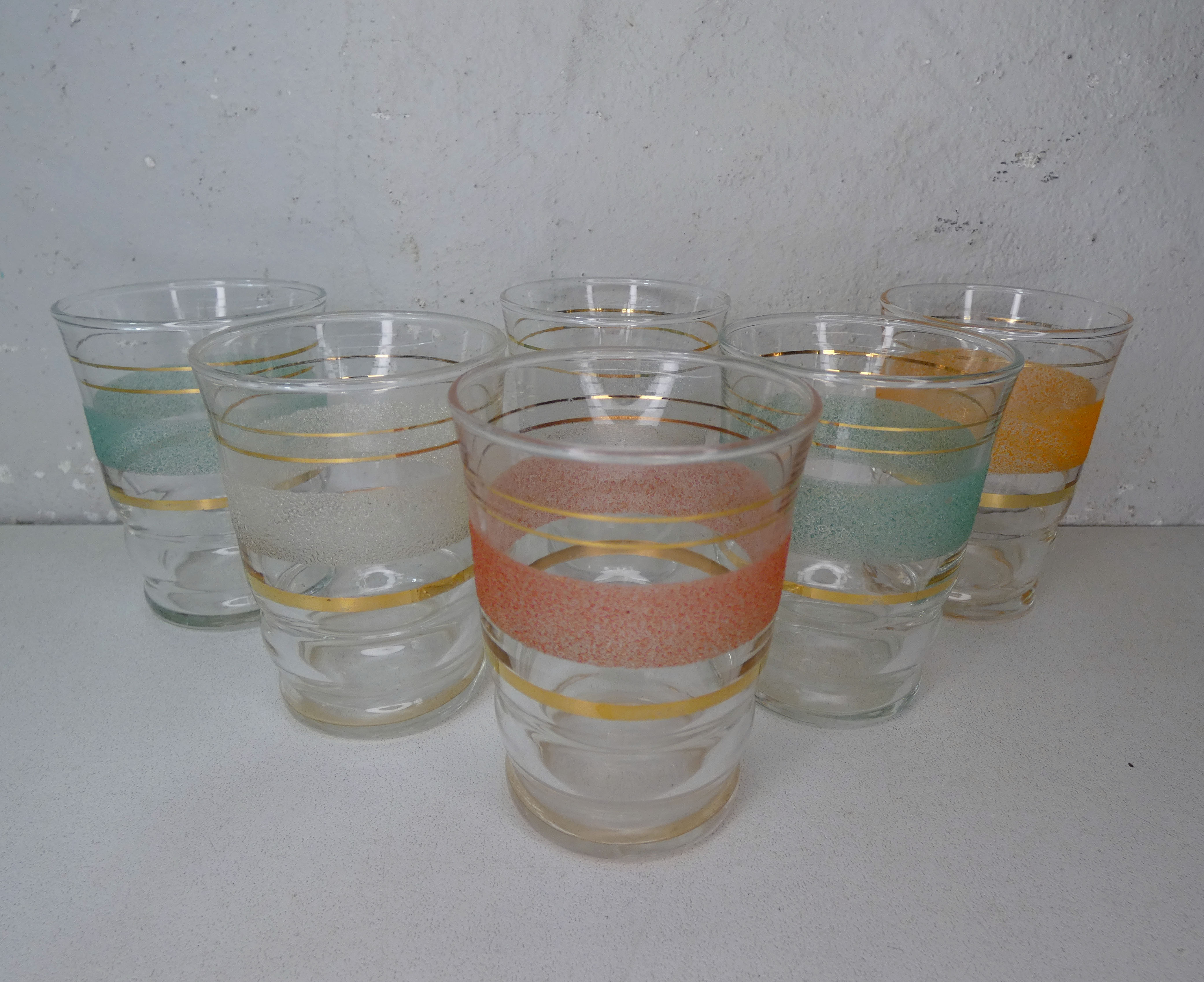 6 old granite glasses of vintage color 50s
