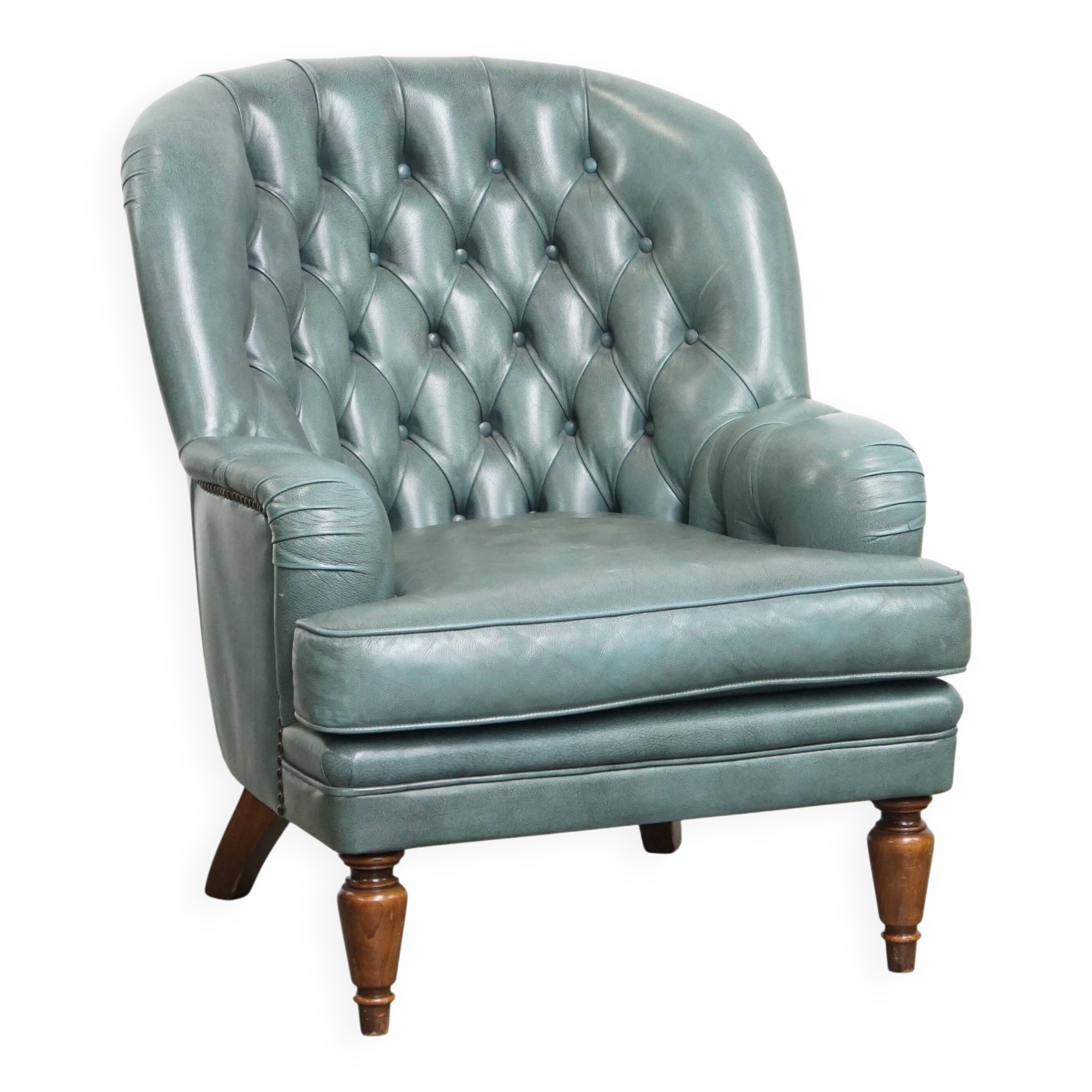 Blue chesterfield armchair made of cowhide leather in English style