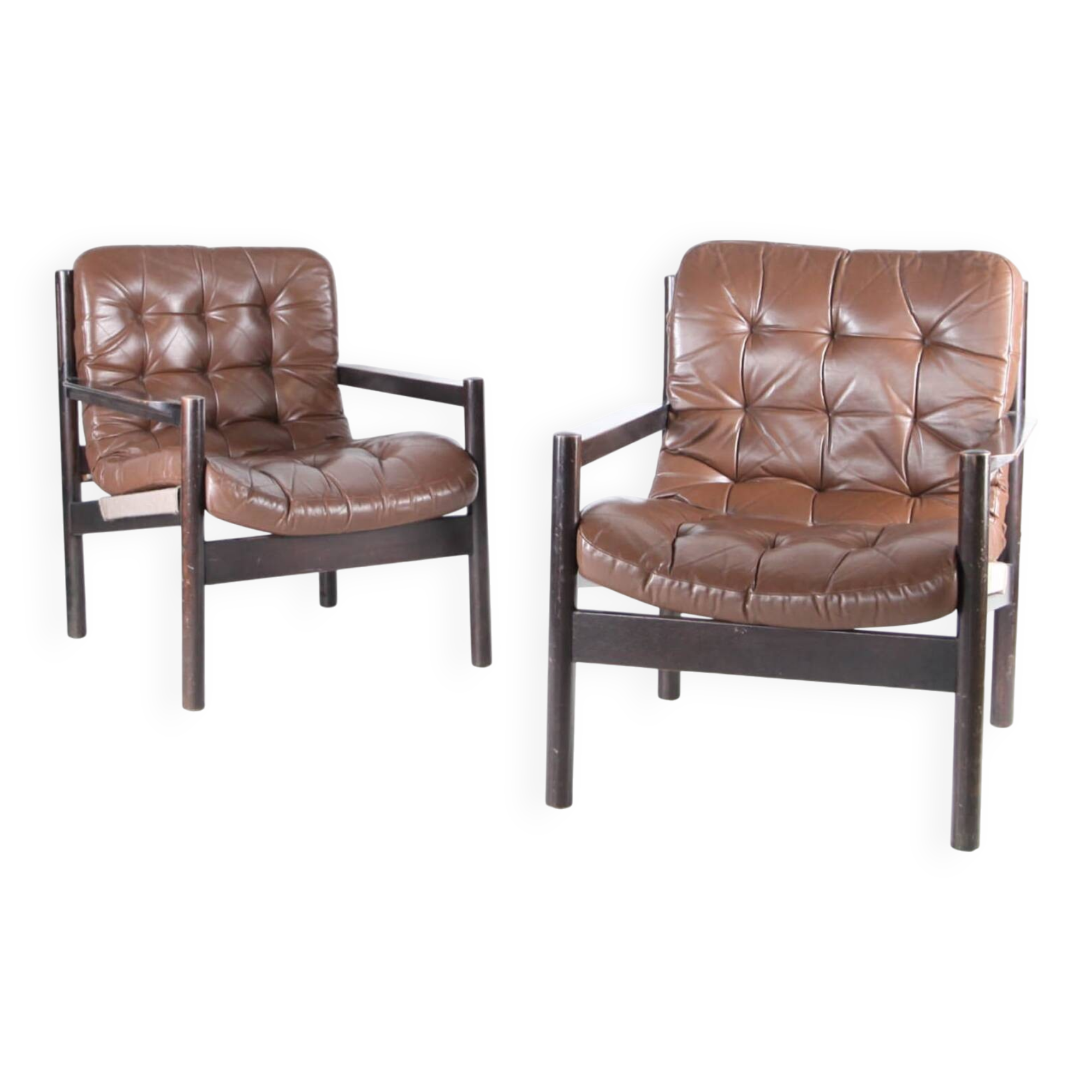 Paire de fauteuils en cuir